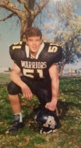 Buck in his High School football uniform.